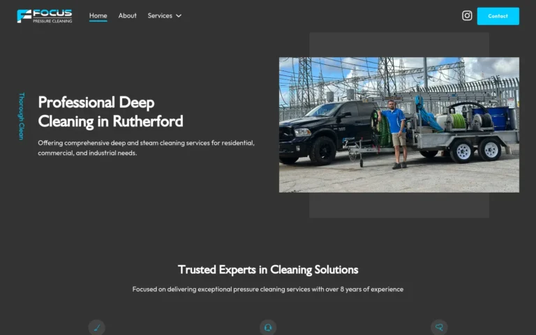 Person near pressure cleaning trailer and truck