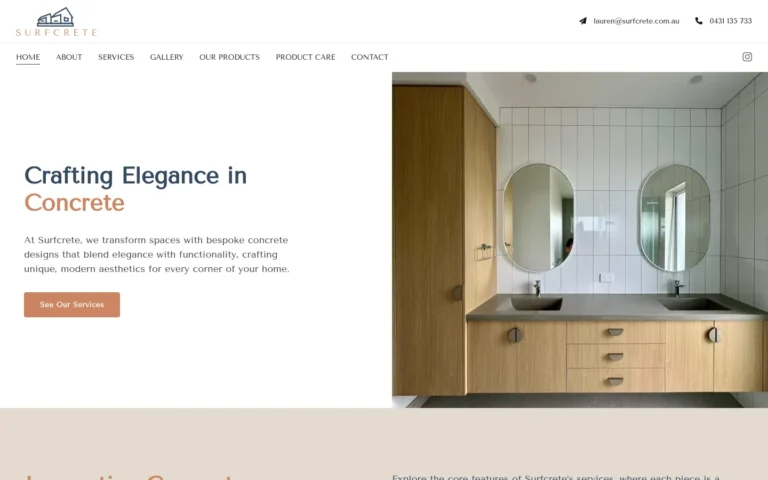 Modern bathroom with concrete countertop and mirrors.