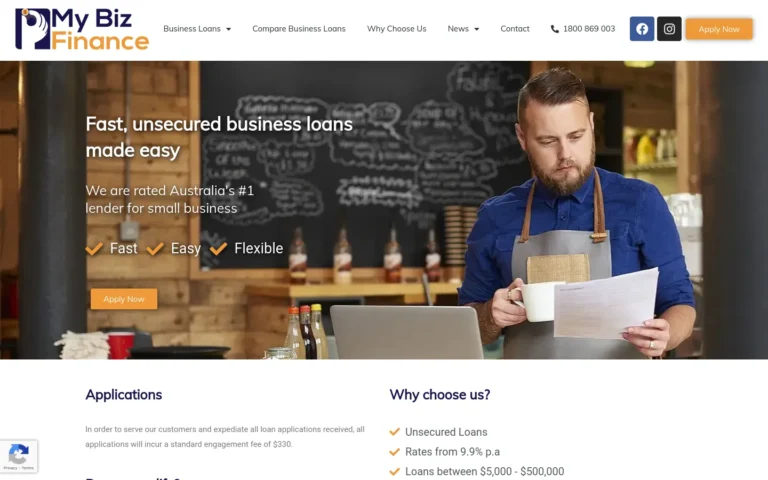 Business owner reviewing loan documents in cafe.