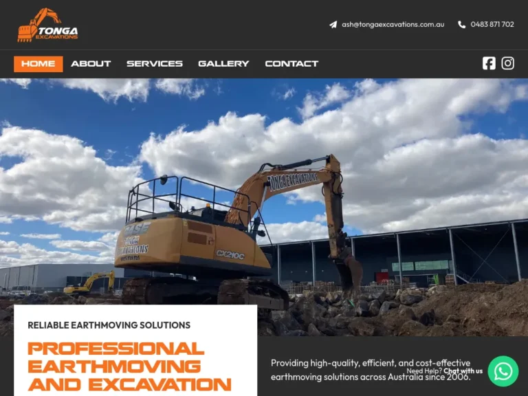 Excavator at construction site under blue sky.