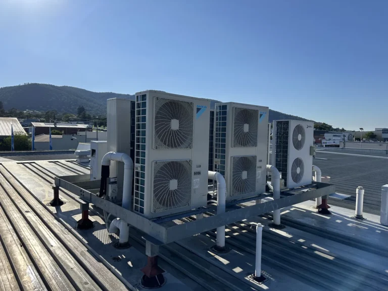 Rooftop air conditioning units against clear sky
