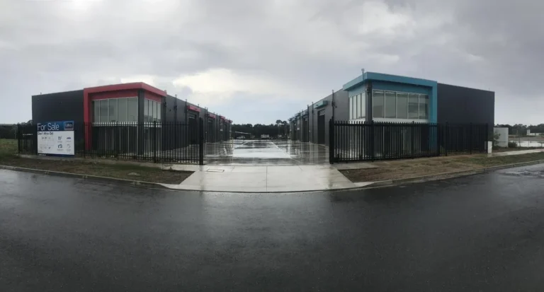 Commercial buildings for sale on cloudy day.