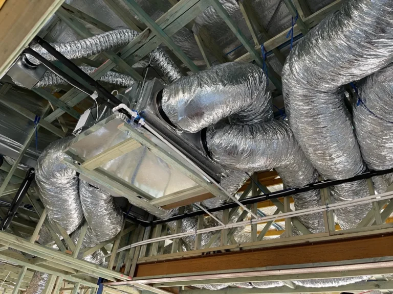 HVAC ductwork installation in building ceiling