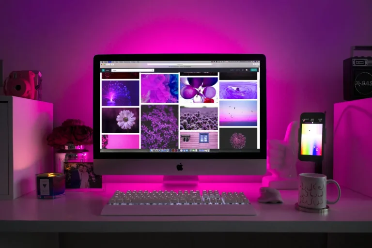 Desktop with purple LED lighting and flowers image