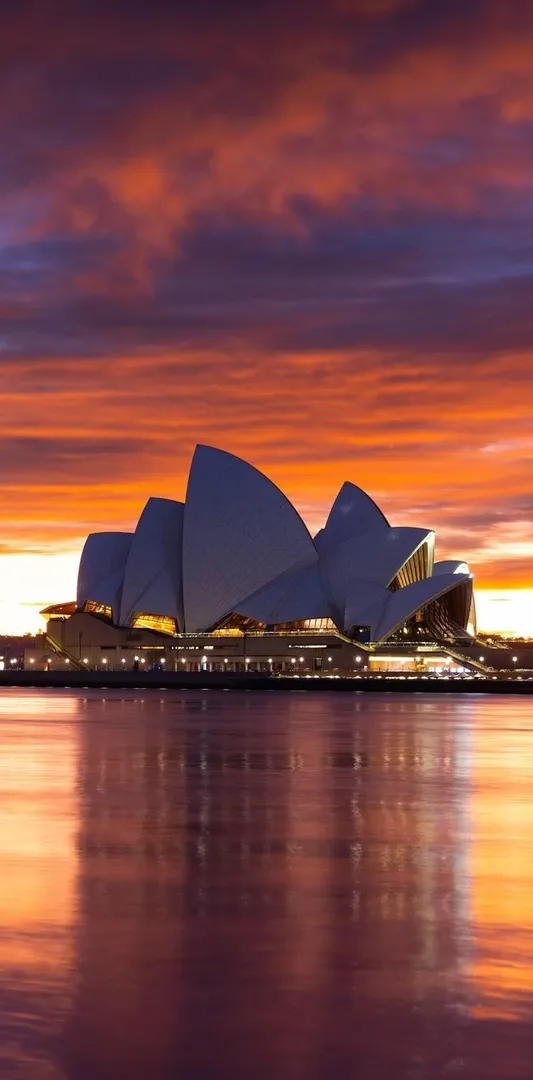Sydney Opera House at sunset with colorful sky